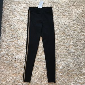 ZARA leggings with gold accents